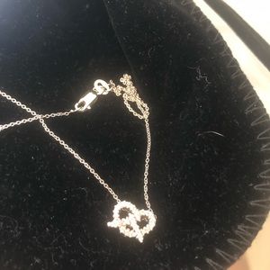 Roberto Coin 18K gold pretzel necklace.